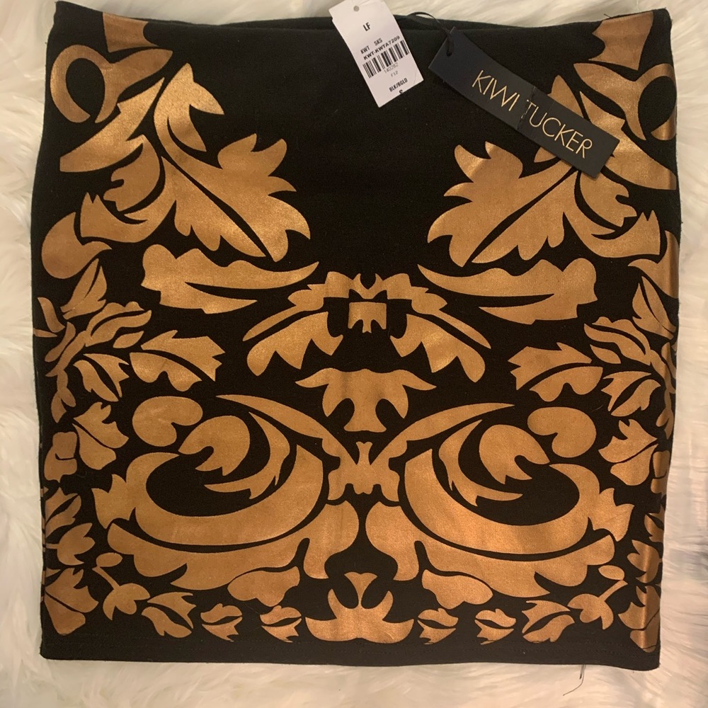 Kiwi Tucker miniskirt size small NWT